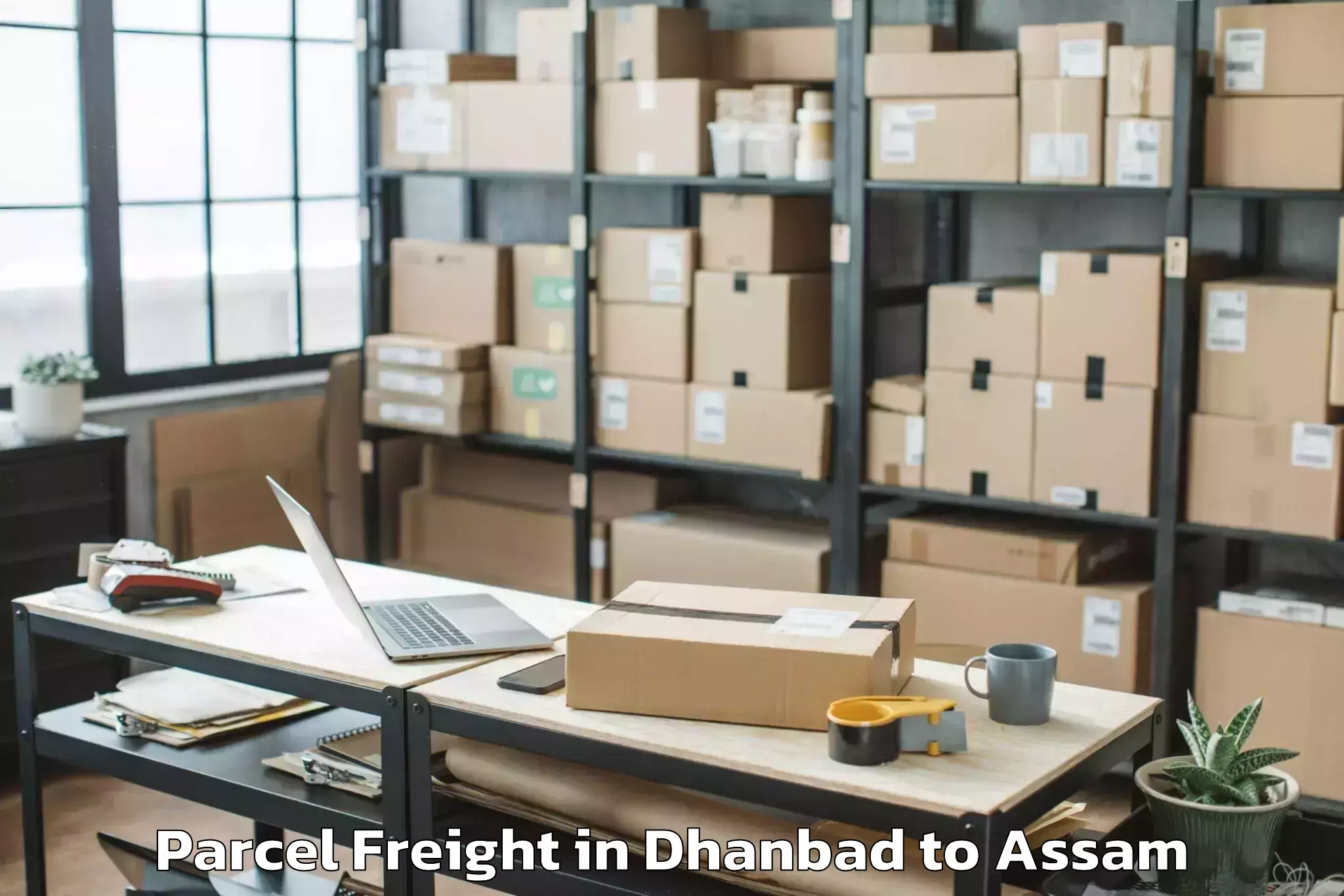 Book Your Dhanbad to Golaghat Parcel Freight Today